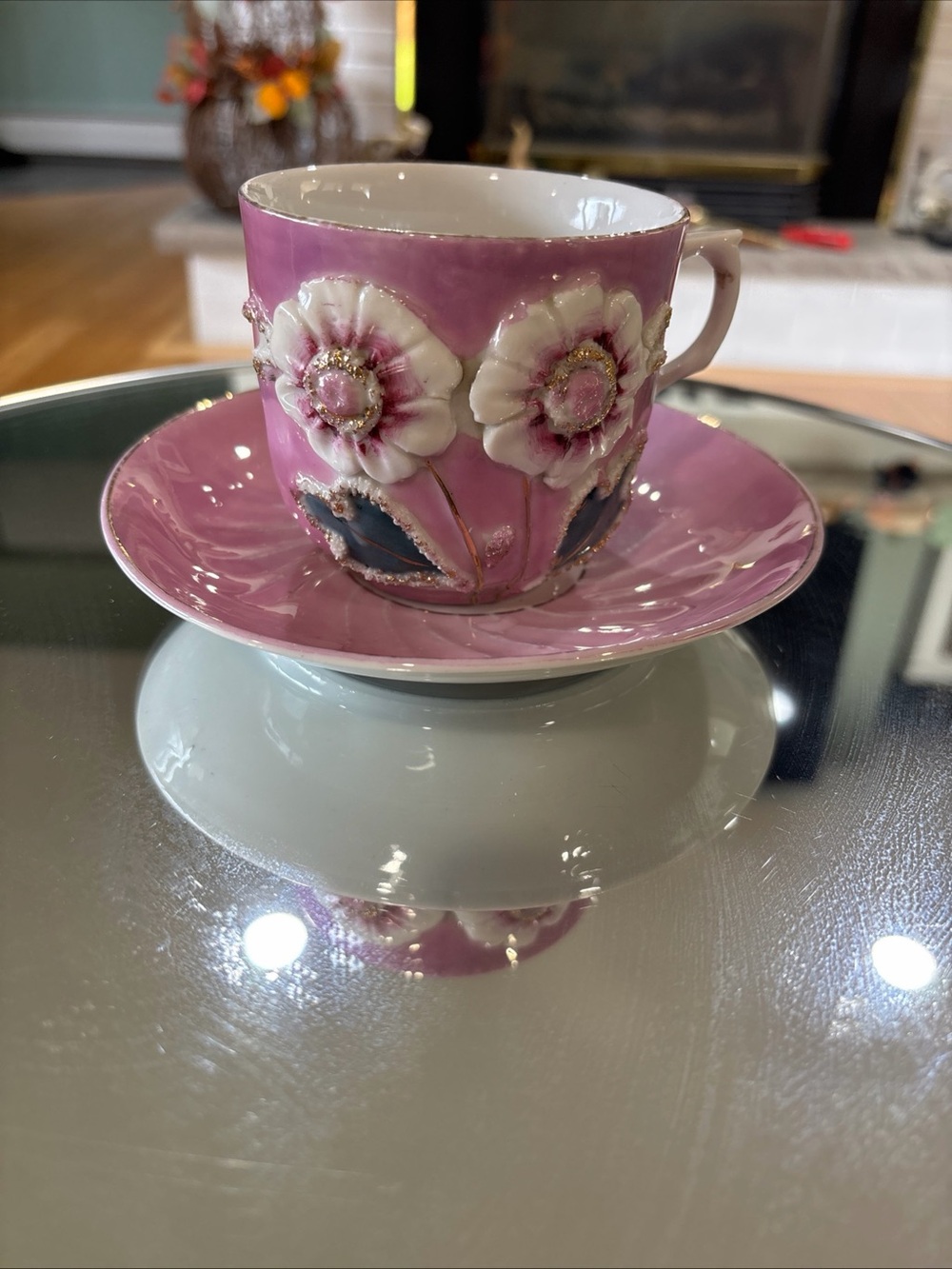 Embossed Pink Ceramic Teacup and Saucer with Floral Relief